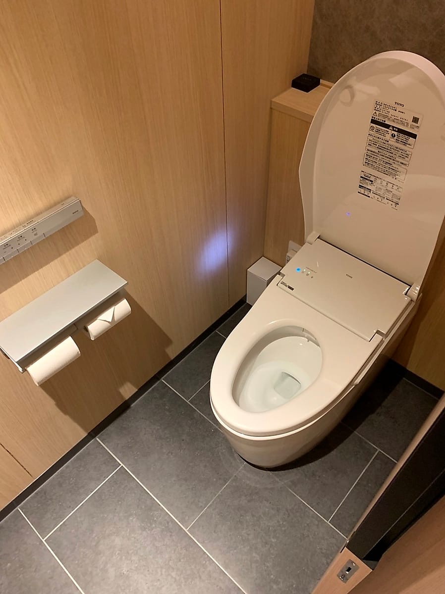 Smart toilet in a hotel room in Kyoto Japan.  This one had all the best features