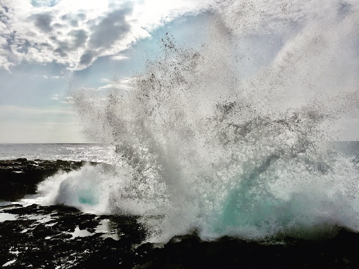 A wave crashing in the Poipu area of Kauai Hawaii