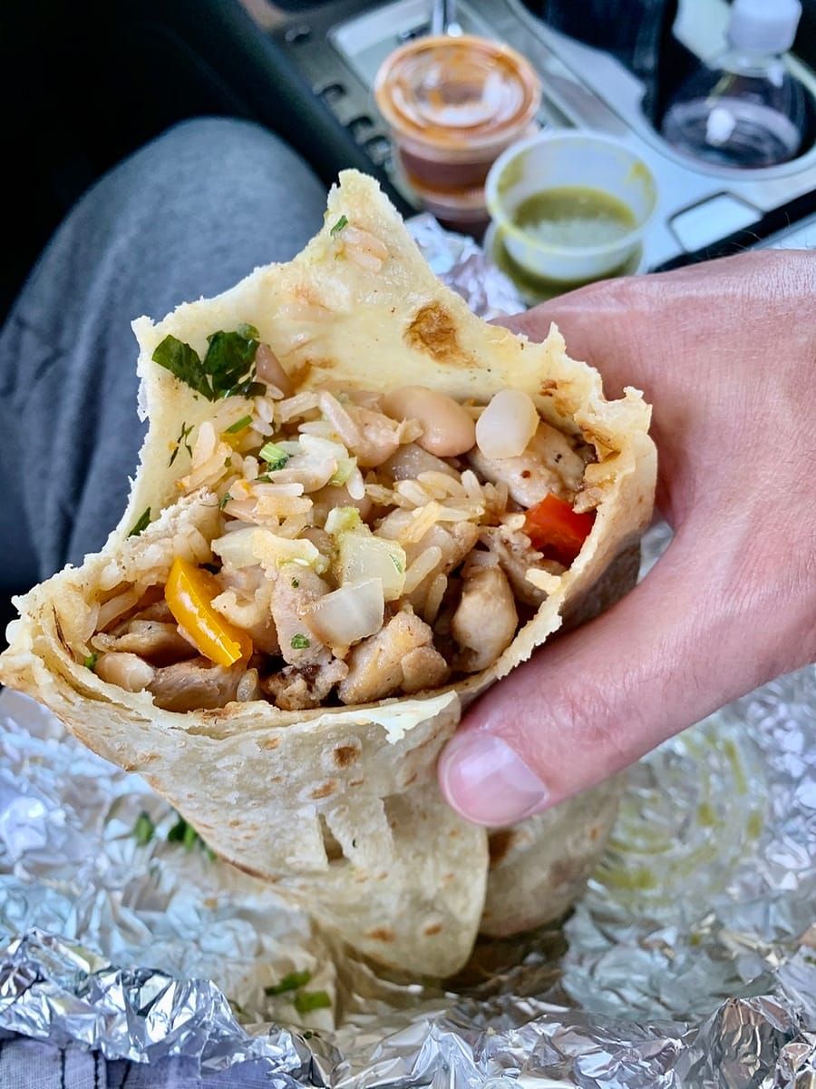 A look inside a delicious chicken burrito from Tacos Los Panchos in Fillmore Utah