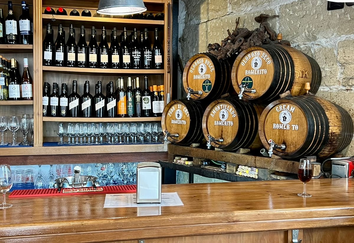 Casks of Sherry line the wall at Tabanco Plateros - a great lunch stop while on a day trip from Seville