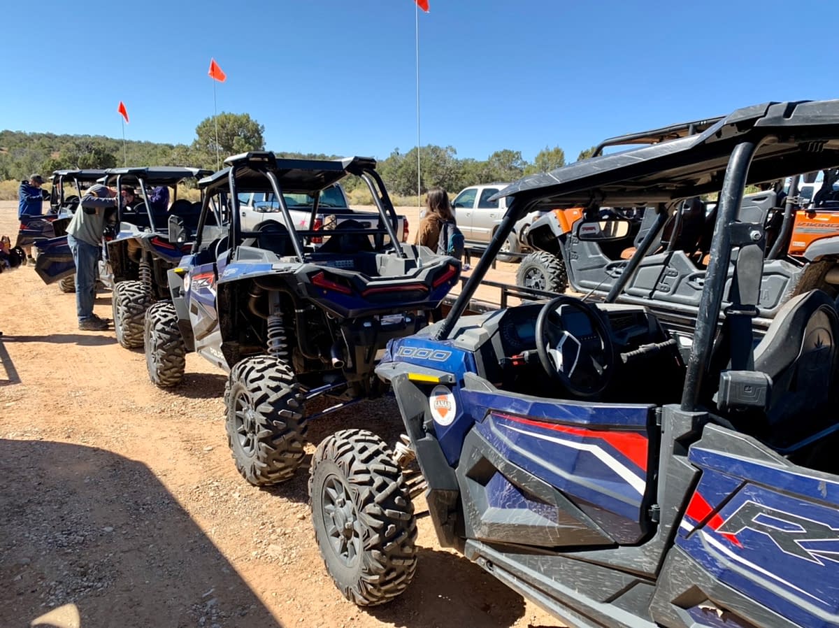 A line up of RZR Side-by-sides getting ready for off road adventures near Kanab Utah