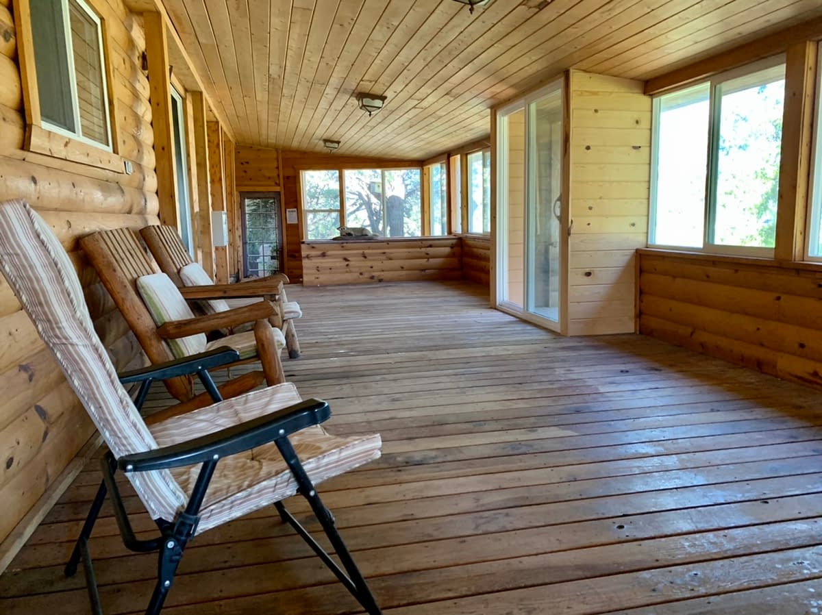 The Large enclosed porch at the Sevier River Ranch