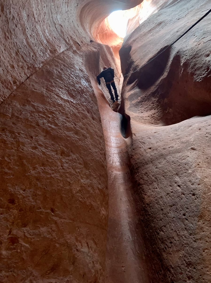 The Thorough Tripper starting his descent in Ladder Slot Canyon