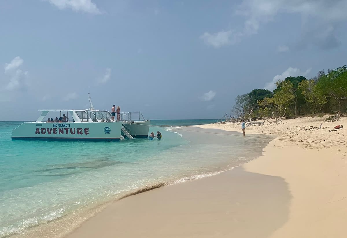 Big Beard's catamaran at Turtle Beach on Buck Island.  Taking a Buck Island snorkeling tour with Big Beard's is one of the great things to do in St Croix