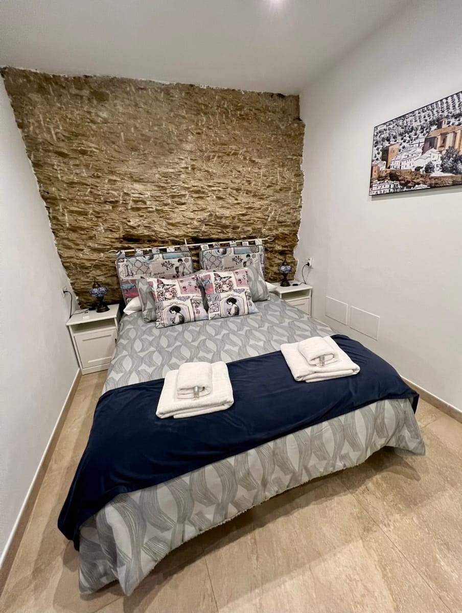 The master bedroom in Casa Cueva El Arrabal
