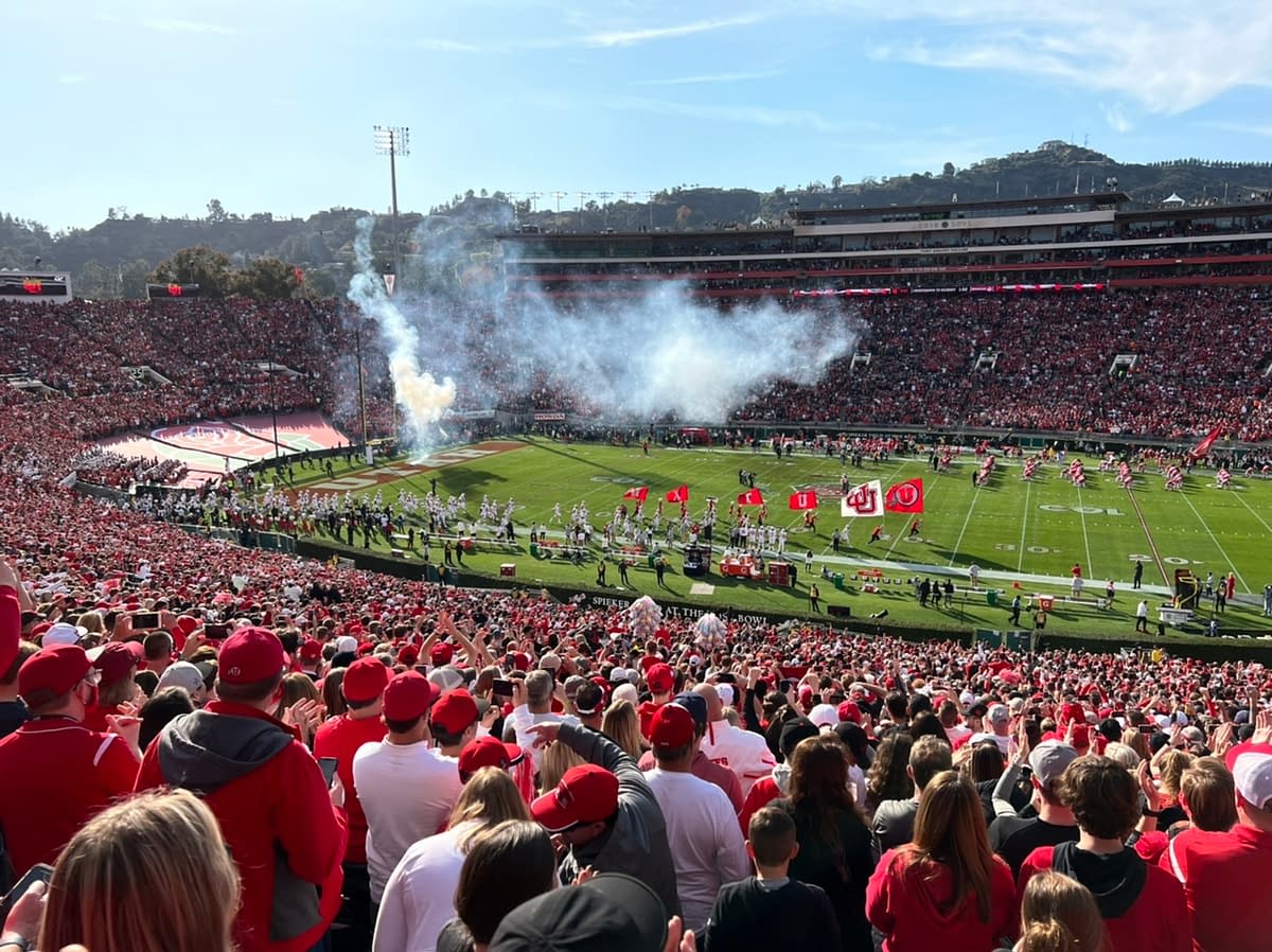 The University of Utah football team enters the field at the 2022 Rose Bowl