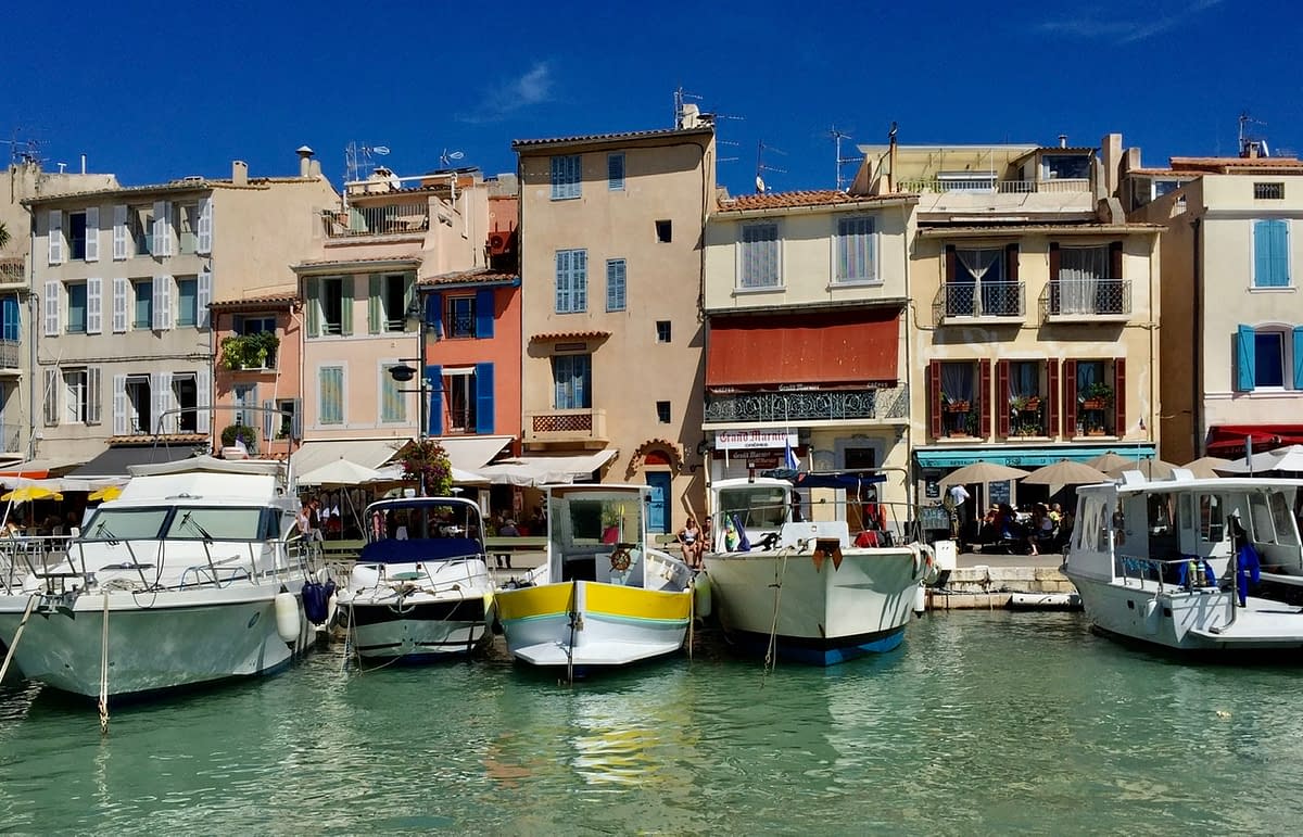 Boats lined up along the harbor in Cassis France