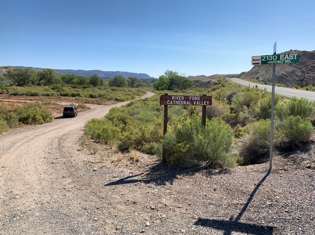 The sign marking the beginning or the Cathedral Valley Loop along Highway 24