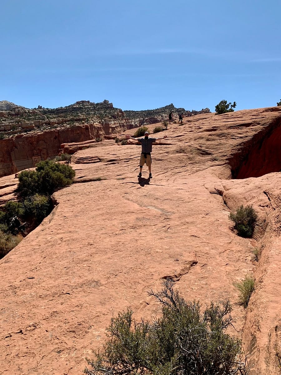 Standing on top of Cassidy Arch with an angle showing it's exact width 
