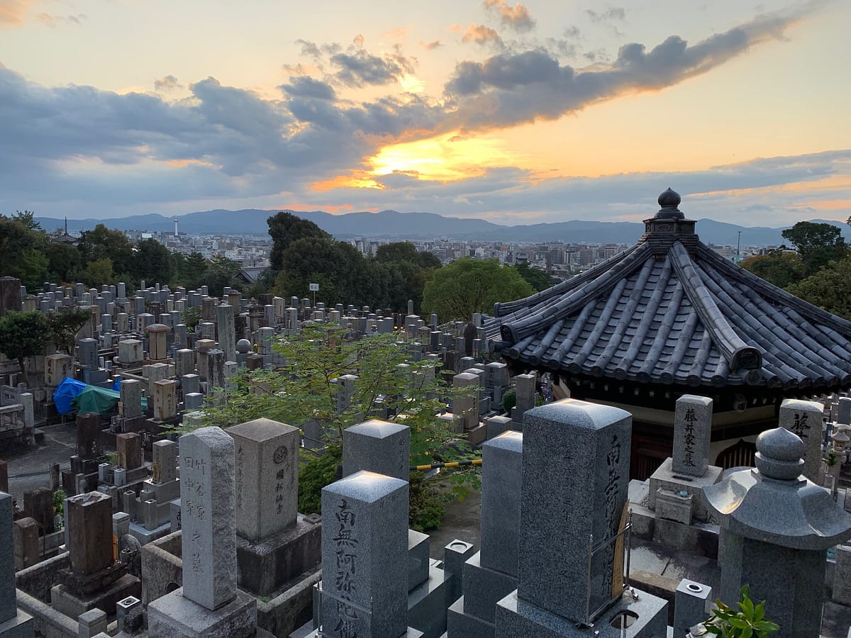 The Higashi Otani Cemetery at sunset in Kyoto Japan