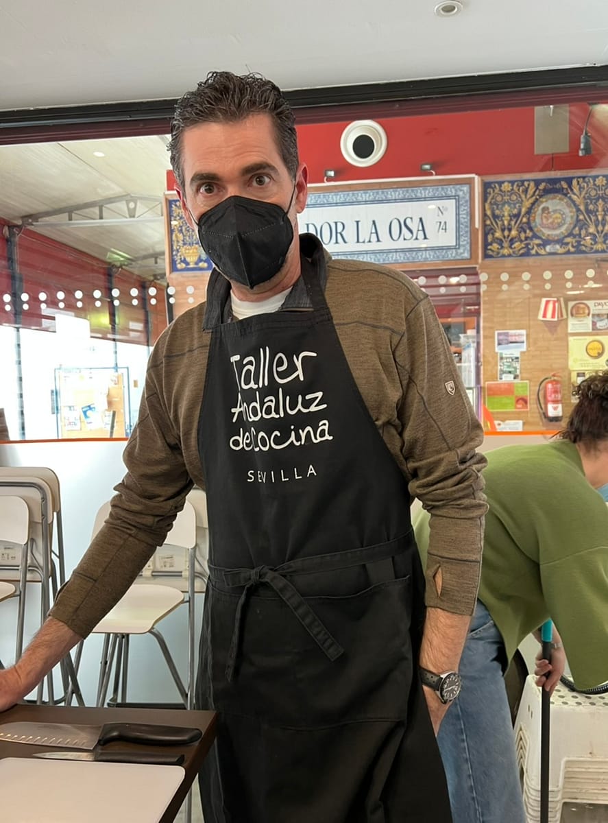 The Thorough Tripper aproned up for his cooking class in Seville