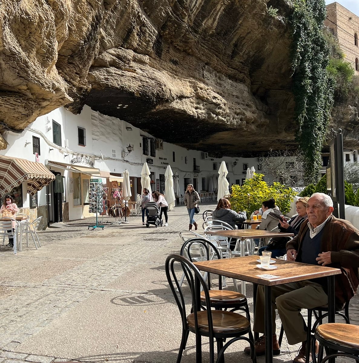 Eating breakfast along Calle Cueva del Sol in Setenil de las Bodegas Spain