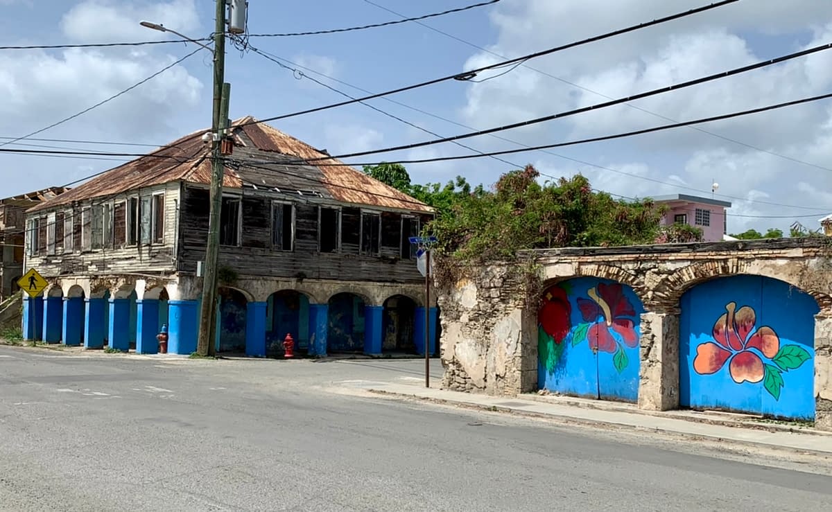 A run down building and street art in Frederiksted St Croix USVI